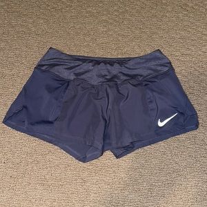purple nike running shorts
